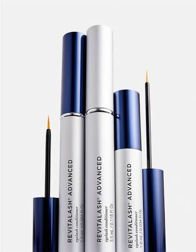 Revitalash Advanced eyelash and brow products on a white background