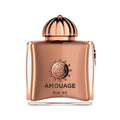 Amouage Dia 40 perfume bottle in a metallic rose gold color with a domed cap, shown on a plain white background.