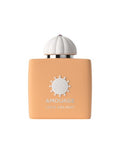 Amouage Love Delight perfume bottle in a warm peach-orange color with a white textured cap, shown on a plain white background.