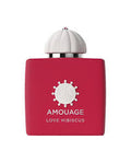 Amouage Love Hibiscus perfume bottle in a vibrant magenta pink color with a white citrus-shaped cap, shown on a plain white background.
