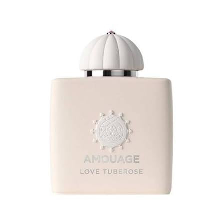 Amouage Love Tuberose perfume bottle in a pale pink color with a white ribbed cap, shown on a plain white background.
