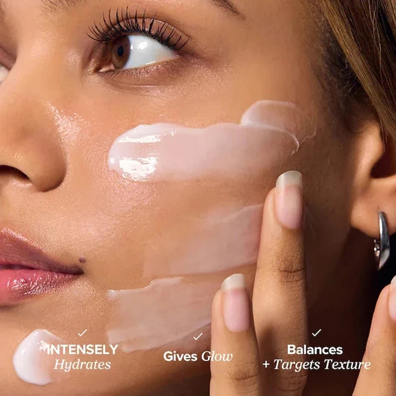 Woman applying cream to her face with text highlighting benefits