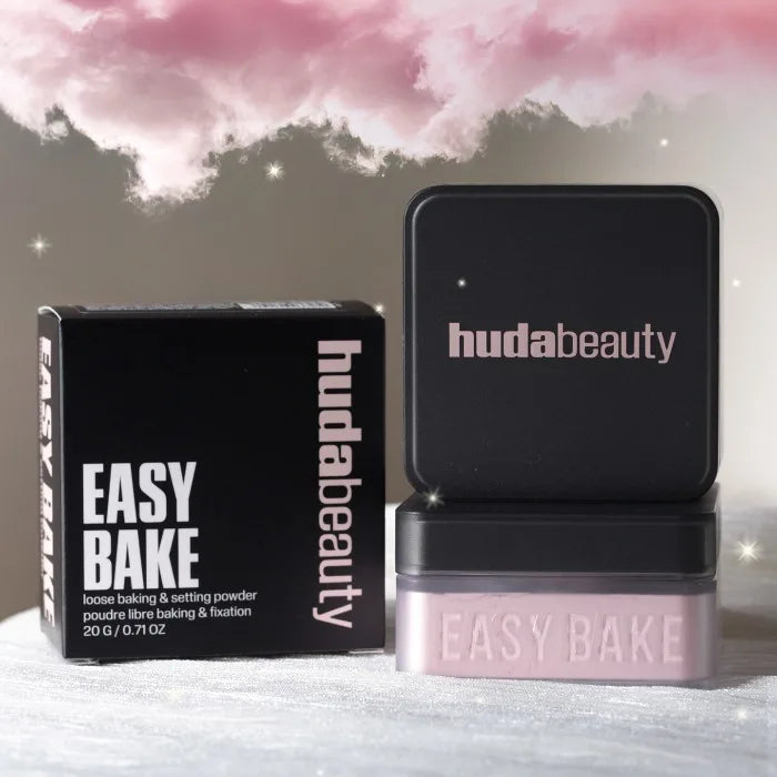 Huda Beauty Easy Bake loose baking and setting powder with packaging on a neutral background