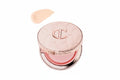 Charlotte Tilbury makeup product with a swatch on a white background