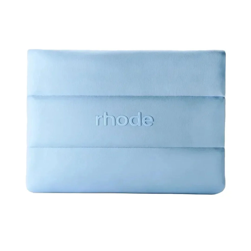Light blue make up bag with 'rhode' branding on a white background