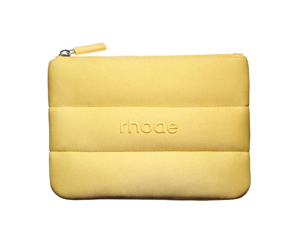 Yellow pouch with 'rhode' branding on a white background
