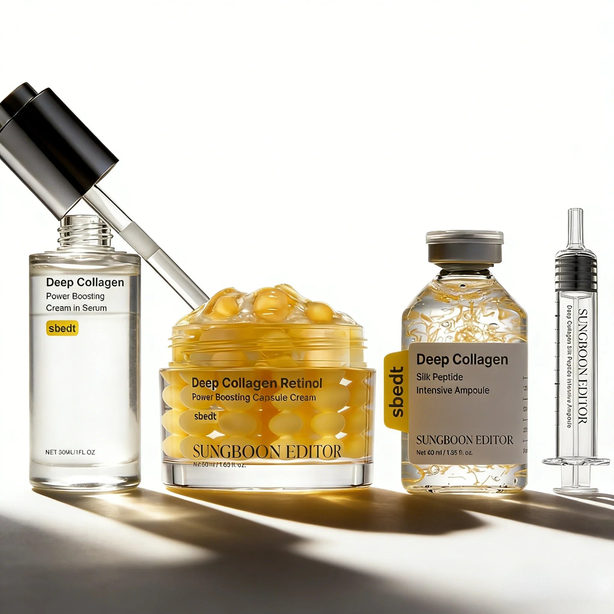 Collection of skincare products including a jar, bottles, and syringe on a white background